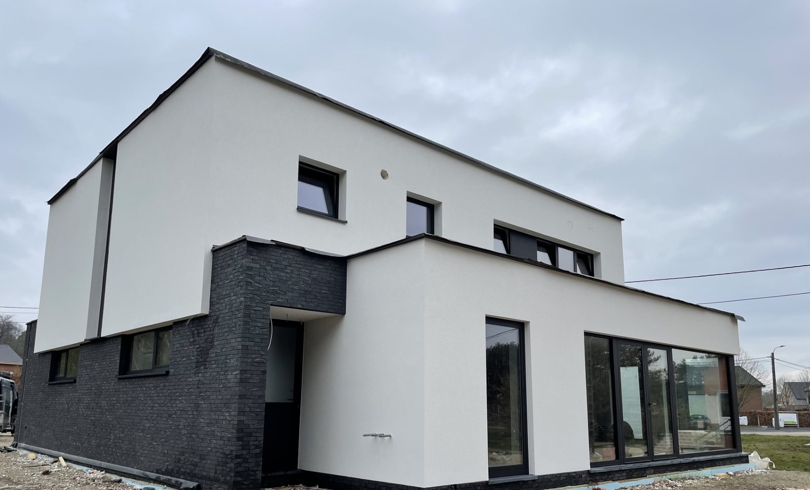 Gepleisterde woning met donkere plint in Aarschot
